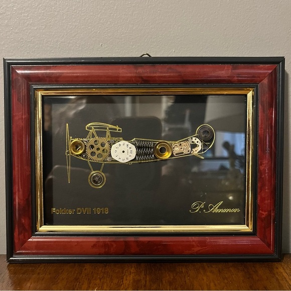 framed piece of art featuring a representation of an airplane with clock pieces - Picture 7 of 10